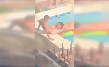 Coloured Couple Dick Sucking In A Pool
